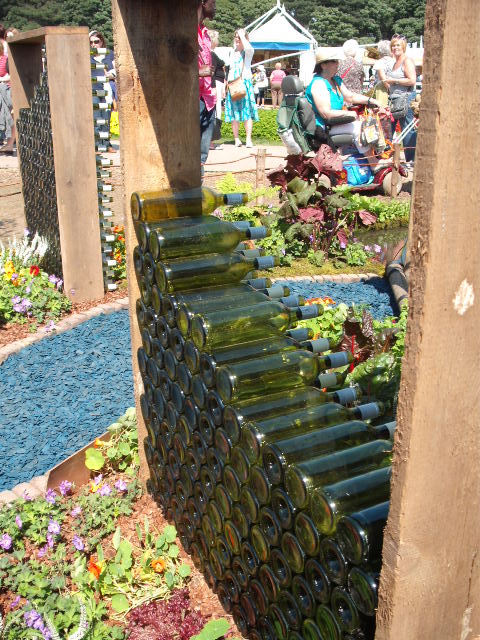 Wall of wine bottles at Tatton Flower Show 2012