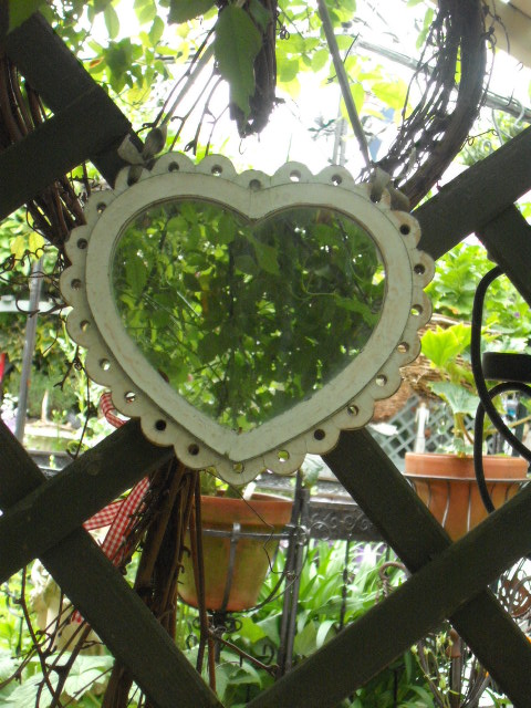 Heart-shaped garden mirror