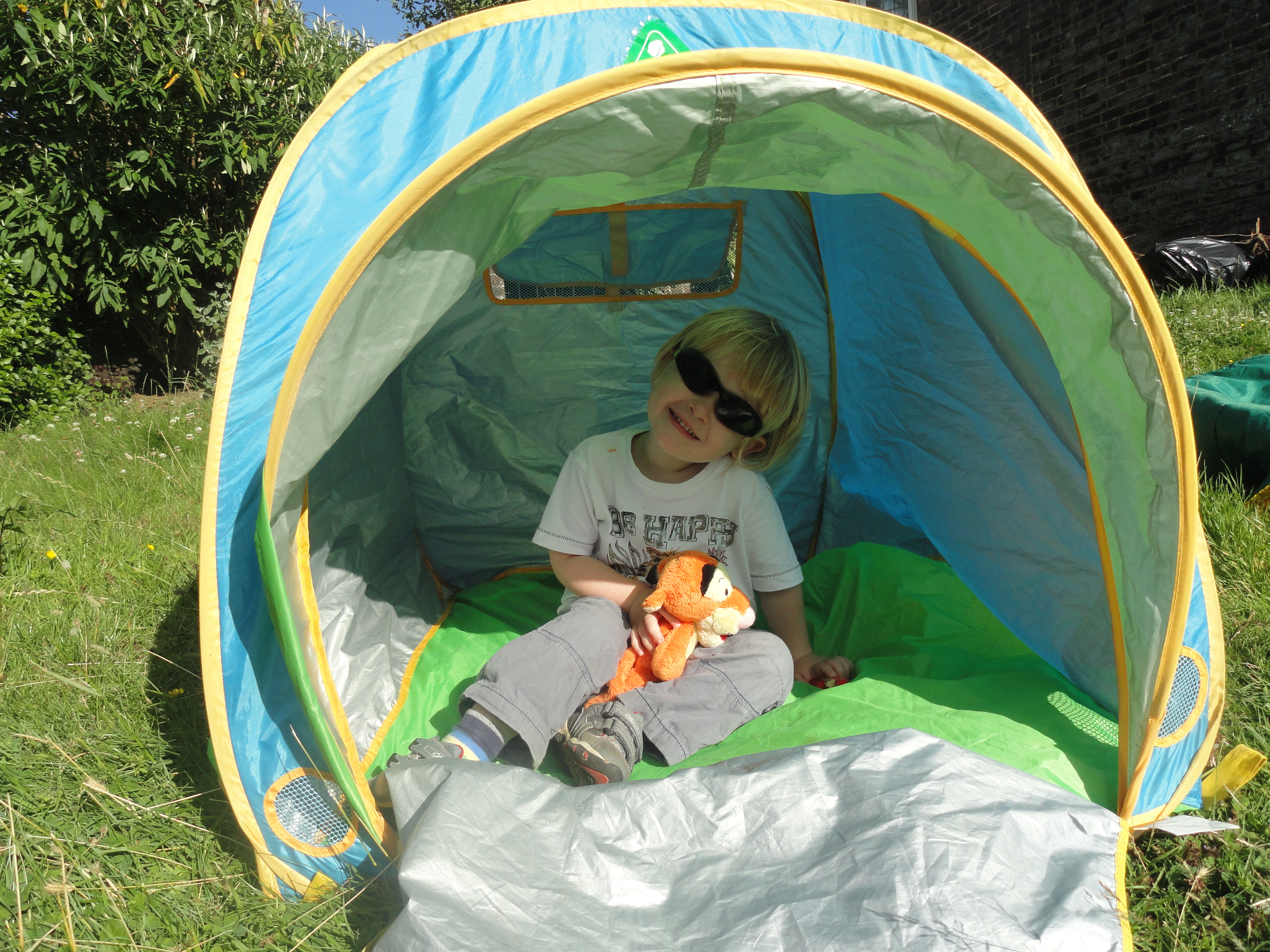 Child sleeping out in tent