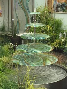 An alluring 5-tier cascading water feature courtesy of Magical imaging's garden